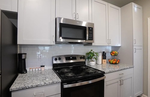 University Place Apartment | Modern 3BD Barsala in University City with Hot Tub & Spa