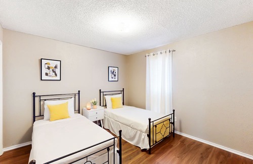 Richardson House | Private home with enclosed backyard, gas grill, sunny interior, & smart TVs