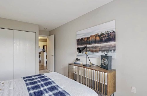 West Bloomington Condo | Balcony Haven: Family-Friendly Retreat with Unique Amenities