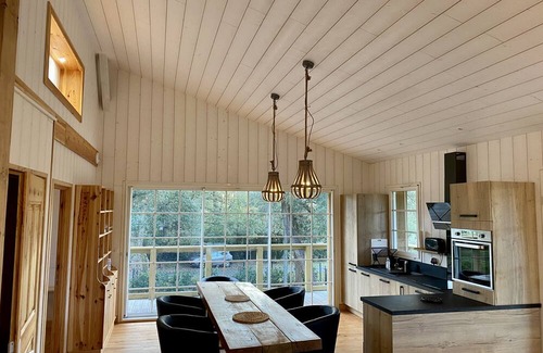 Saint-Julien-en-Born Villa | Experience Tranquility at La Cabane sur le Courant Hotel