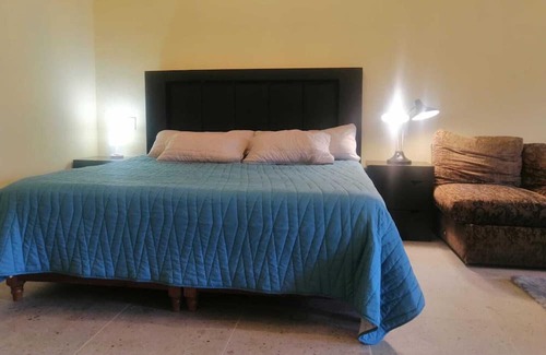 El Zacatal Apartment | Convenient Stay Near Airport and Beaches with Parking
