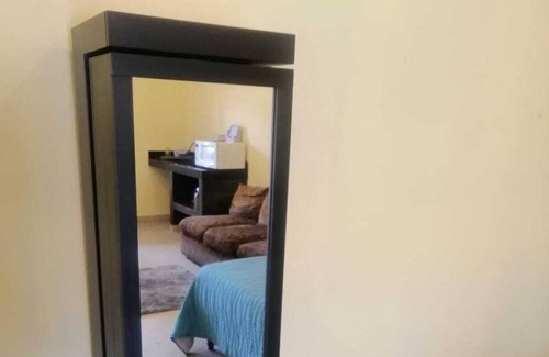 El Zacatal Apartment | Convenient Stay Near Airport and Beaches with Parking