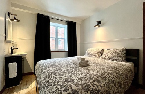 Saint-Jean-Baptiste Apartment | Cozy Condo Retreat with Mezzanine and Inviting Terrace