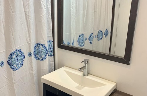 Villa Rosa Condo | Relaxing 4-Bedroom Condo with AC & WiFi near Lagoon Pilar