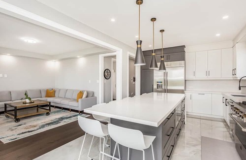 Brampton House | Luxury Six Bedroom home with main floor ensuite and spacious backyard.