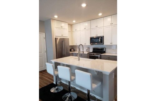 Aurora House | Trendy Home Office Retreat with Child-Friendly Amenities
