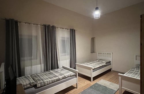 Jork Apartment | Private Rooms with Kitchen, Smart TV & Family-Friendly Amenities