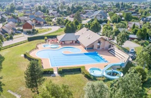 Le Bourg-d'Oisans House | Experience Nature at Camping 4 Étoiles with Family-Friendly Amenities