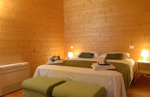 Montecarlo Apartment | Cozy Casina di Legno near the Medieval Borgo of Montecarlo