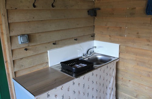 Lostwithiel Cabin | Idyllic Wooden Lodge Near River Fowey with Breakfast Included