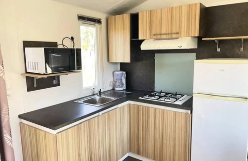 Saint-Denis-du-Payre House | Relaxing Mobile Home at Camping O Beau Laurier, Ibiza