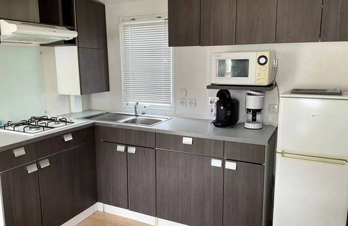 Saint-Denis-du-Payre House | Cozy Camping O Beau Laurier: Oceanfront Mobile Home Retreat