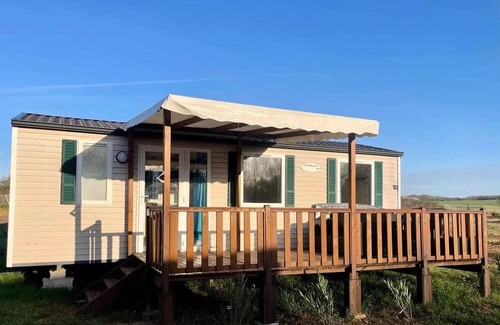 Saint-Denis-du-Payre House | Cozy Camping O Beau Laurier: Oceanfront Mobile Home Retreat