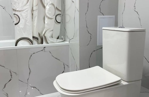 Nur-Sultan Apartment | Cozy Apartment at the Botanical Gardens with Breakfast