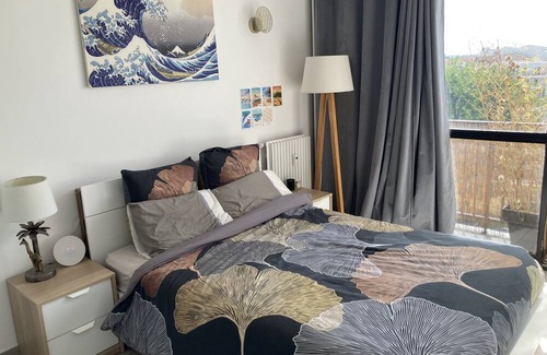 Bezons Apartment | Relaxing Retreat Near Paris with Ocean Views & Hot Tub