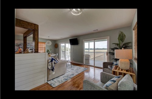 Midway House | Pet-Friendly Waterfront Retreat with Dock and Pool
