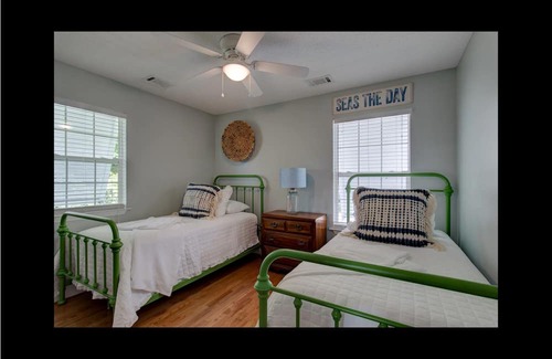 Midway House | Pet-Friendly Waterfront Retreat with Dock and Pool