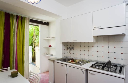 Sant'Angelo Apartment | Inviting Apartment with Beautiful Garden Views for Families