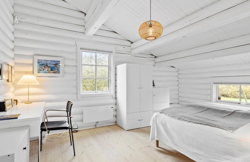 Dronningmolle House | Relax in a Cozy Beachside Log Cabin with Ocean Views
