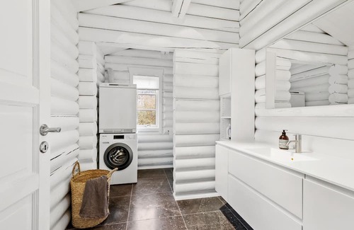 Dronningmolle House | Relax in a Cozy Beachside Log Cabin with Ocean Views