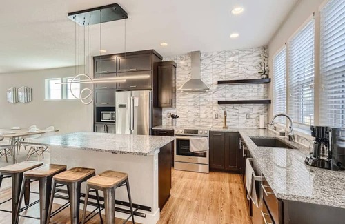 Twin Lakes House | Modern Retreat with Game Room and Family-Friendly Backyard