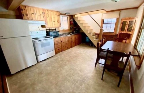 Kents Hill Cabin | Charming 2-Bedroom Camp with Lake Views & Pool Access