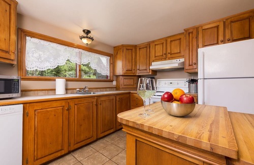 Baie-St-Paul Ski Chalet | Idyllic Cottage Retreat with Private Lake & Kids' Amenities
