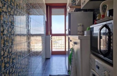 Nettuno Apartment | Family-Friendly Stay at Mare Fuori with Kitchen Amenities
