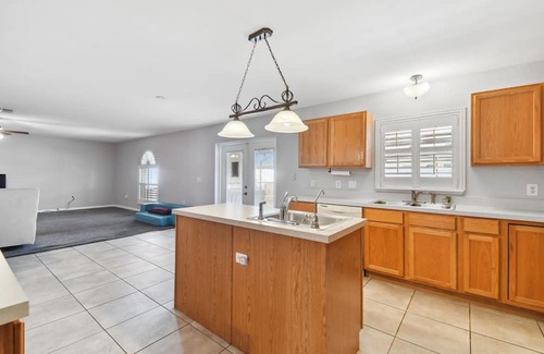 Boyette House | Inviting 4-Bedroom Home with Heated Pool for Families