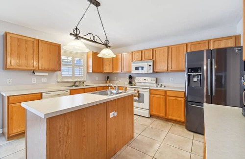 Boyette House | Inviting 4-Bedroom Home with Heated Pool for Families