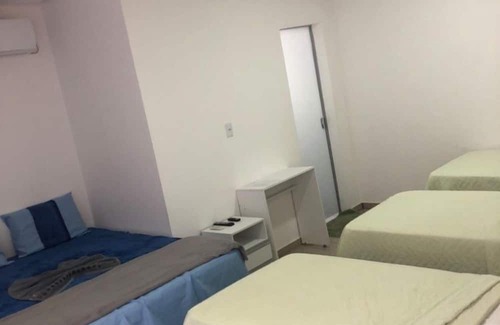 Carolina Hotel | Budget-Friendly Carolina Palace Hotel with Pool & Breakfast