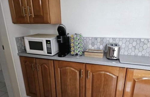 Bellefontaine Neighbors Apartment | Delightful 1-Bedroom Apartment in Devonshire Parish