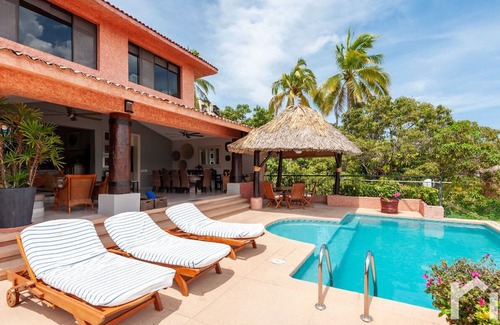 Playa Guitarron House | Relaxing Beach House Retreat with Spa & Family-Friendly Amenities