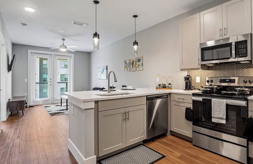 Fort Worth Apartment | Modern Elegance Retreat: Gym, Pool & Pet-Friendly Stay