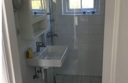 Wasserkoog Apartment | Discover Comfort at the Old Sea Dike Vacation Home