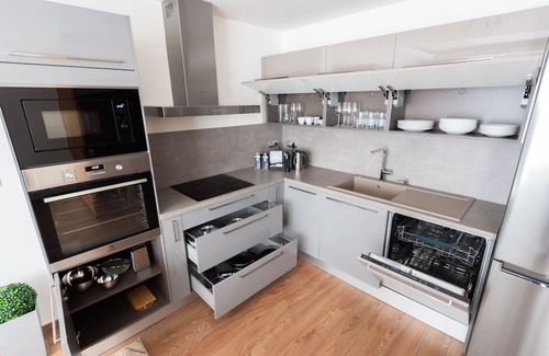 Karlin Apartment | Osko Apartments: Family-Friendly Retreat with Spa and Kitchen