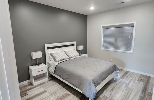 Stuart House | Tranquil Family Home with Kitchen for Memorable Getaways