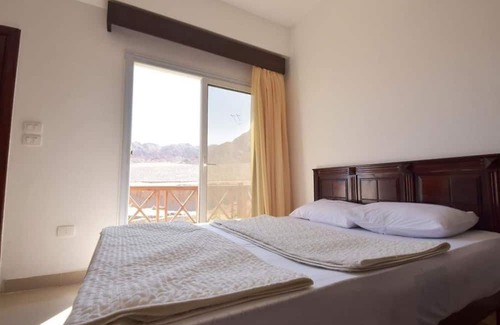 St. Catherine Resort | Experience Sunny Dahab: Family-Friendly Stay with Pool Access