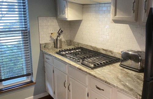 CUF Condo | Stylish Condo with Deck and City Views Near Exciting Attractions