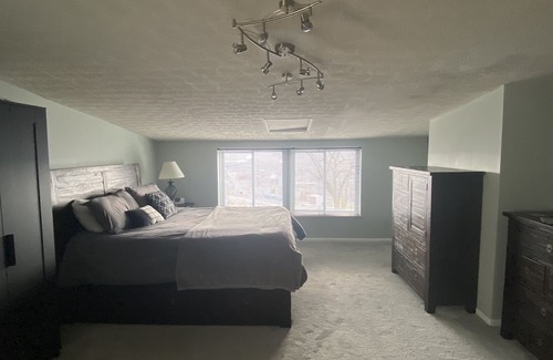 CUF Condo | Stylish Condo with Deck and City Views Near Exciting Attractions