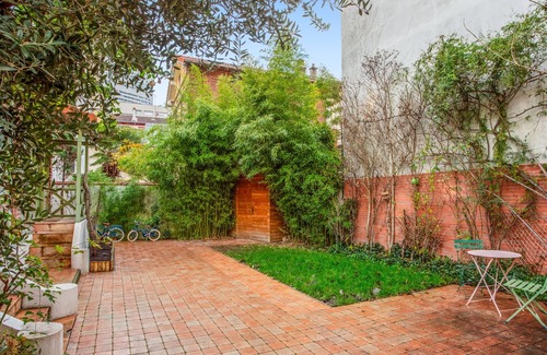 Cœur de Ville House | Family-Friendly Retreat with Garden in Courbevoie - Welkeys