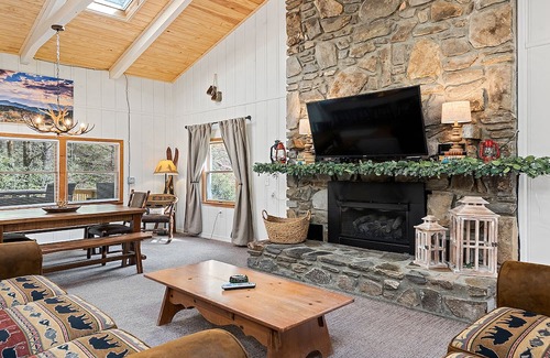 Maggie Valley Cabin | Inviting Creekside Retreat with Pool and Breakfast Included