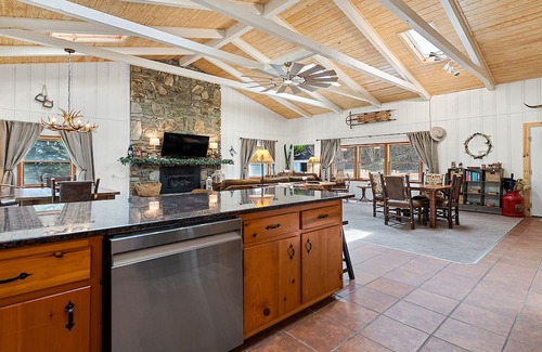 Maggie Valley Cabin | Inviting Creekside Retreat with Pool and Breakfast Included