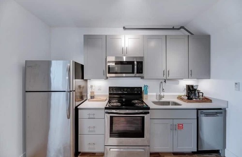 Wilson Apartment | The Whirlistay- family friendly, downtown Wilson, next to the whirligigs!