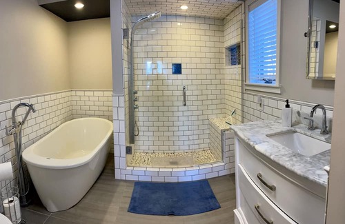 Cadillac Cottage | Charming Lakefront Cottage with Ocean Views & Modern Amenities