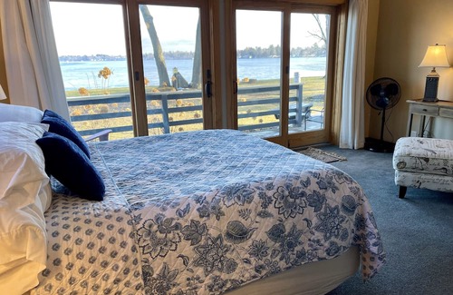 Cadillac Cottage | Charming Lakefront Cottage with Ocean Views & Modern Amenities