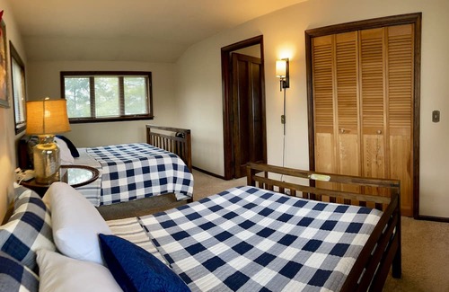 Cadillac Cottage | Charming Lakefront Cottage with Ocean Views & Modern Amenities