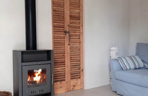 Agii Theodori Apartment | Eco-Friendly Beachfront Studio with Garden and Sea Views