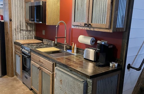 Elkins Cabin | Unique Grain Bin Tiny Home: An Unforgettable Stay Awaits