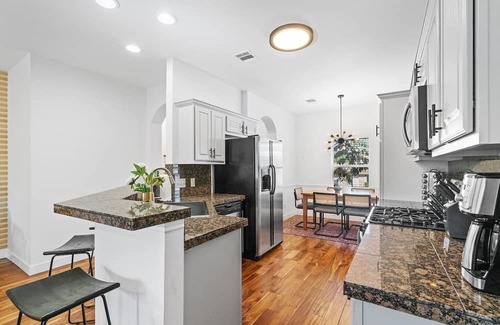 University Hills and Windsor Park House | Inviting East Side Digs with Heated Cowboy Pool